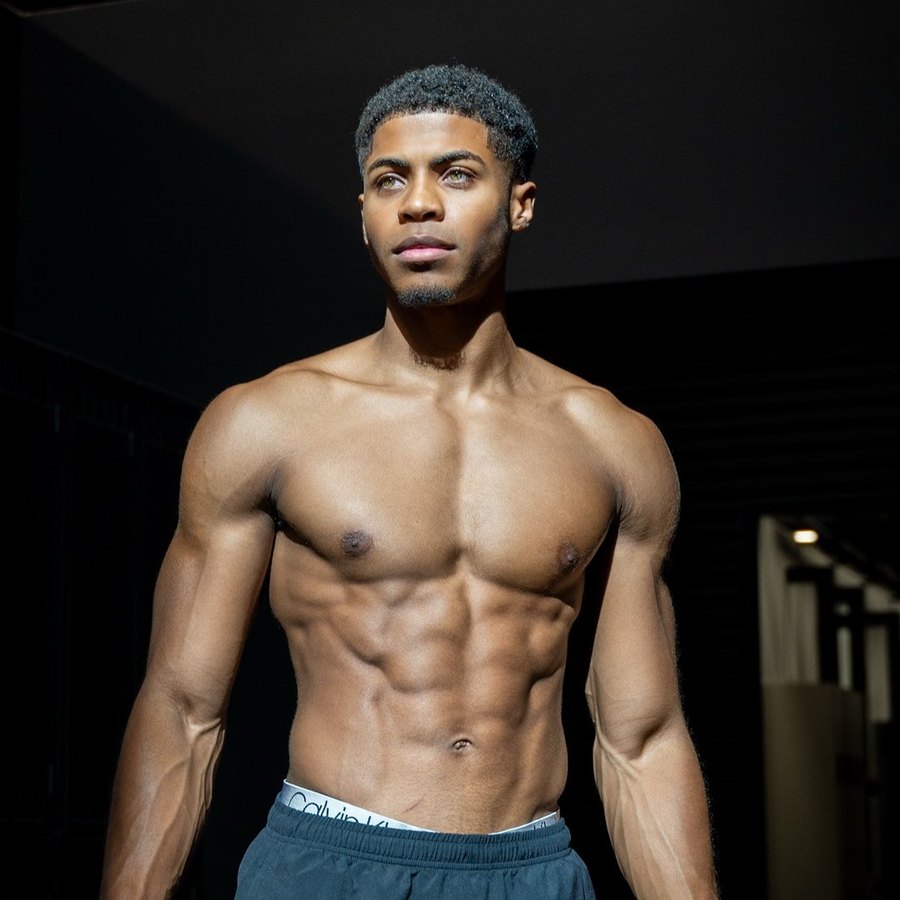 Jehvon Gairy, photographed against a dark studio wall.